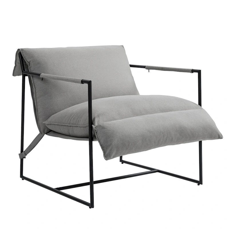 Fauteuil d'appoint en tissu, avec structure en métal et assise suspendue.